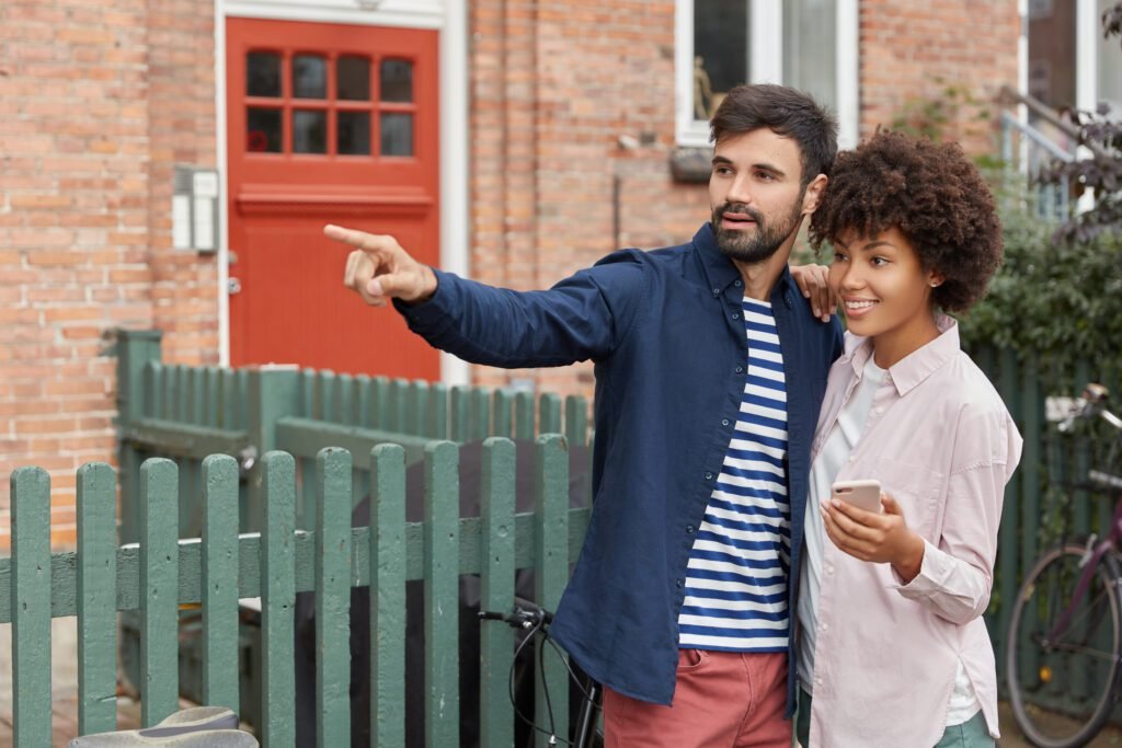 photo black woman caucasian guy have outdoor walk stand closely - DSM PROPERTIES